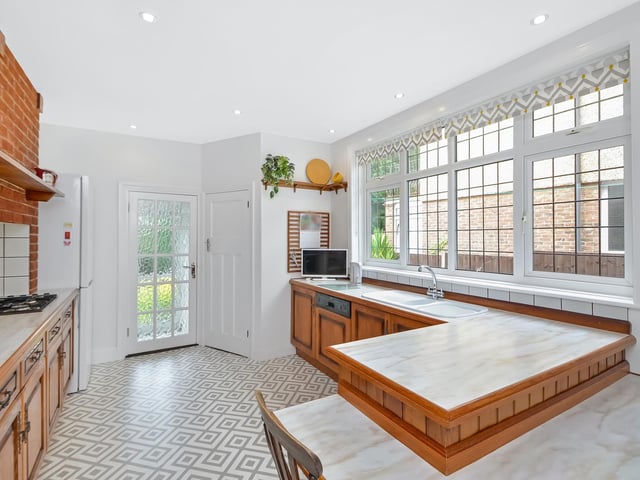This four-bedroom detached house is on sale at a guide price of £715,000. it is listed by Town and Country Southern.