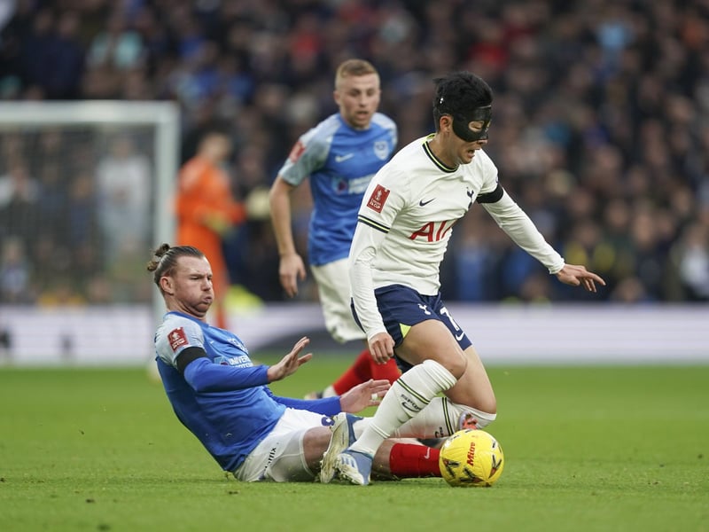 Ryan Tunnicliffe tackles Spurs forward Son Heung-Min at the Tottenham Hotspur Stadium. Picture: Jason Brown/ProSportsImages