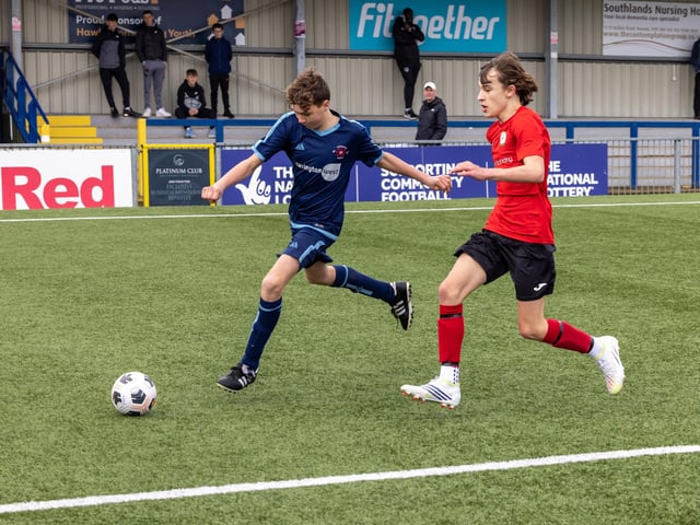 Action from the Under-14 Memorial Challenge Cup final between Pickwick Youth Pumas (all blue kit) and Horndean Youth Red. Picture: Mike Cooter