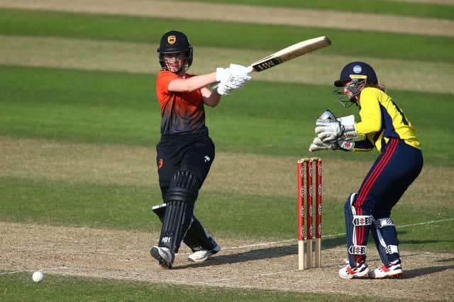 Emily Windsor hits out during her unbeaten 47 for the Vipers in their Rachael Heyhoe Flint Trophy win against South East Stars at The Oval. Photo by Jordan Mansfield/Getty Images.