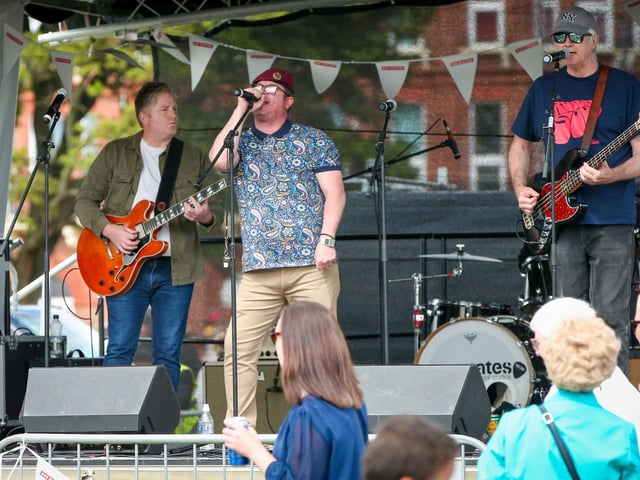 Island City perform on stage. Portsmouth's Armed Forces Day, Southsea CommonPicture: Chris  Moorhouse (080624-60)
