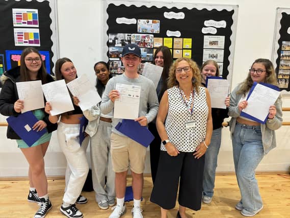 A group of Mayfield Students celebrate with Cllr Suzy Horton, Portsmouth City Council's Cabinet Member for Children, Families and Education.
