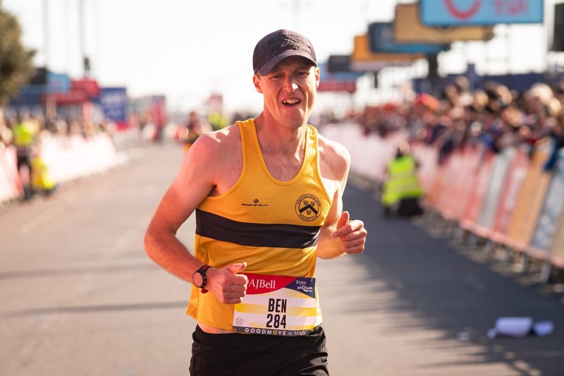 Pictured is: Runners cross the line to finish
