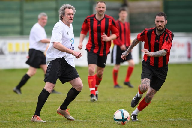 Action from the Jon Gittens memorial charity match between a team of former Fareham Town players and a side of ex-Pompey and Southampton professionals. Picture: Keith Woodland (160421-788)