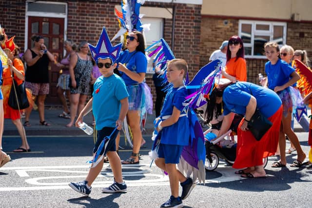 Carnival goers at Queens Street, Portmouth. Photo by Matthew Clark