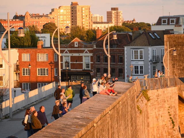 Pictured is: People on the Hotwalls watch the MV Resilient Lady sail
Picture: Keith Woodland (140921-52)