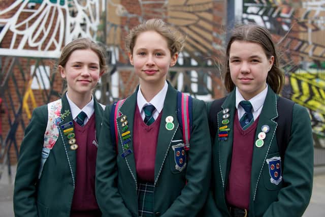 Friends, Dulcie Davis,12, Evie Hext 13 and Rachel Dillon, 13, are sad and confused that the school is closing early.

Picture: Habibur Rahman