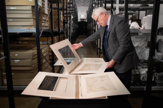 Professor Dominic Tweddle, Director General of the National Museum of the Royal Navy, looks at one of the 'Armada Maps' at Portsmouth Historic Dockyard. The 10 rare maps costing £600,000, which plot the defeat of the Spanish Armada, have been saved from export by two grants from the National Heritage Memorial Fund and the Art Fund, along with a public fundraising campaign which raised the shortfall in funding in just two months.. Photo: Andrew Matthews/PA Wire