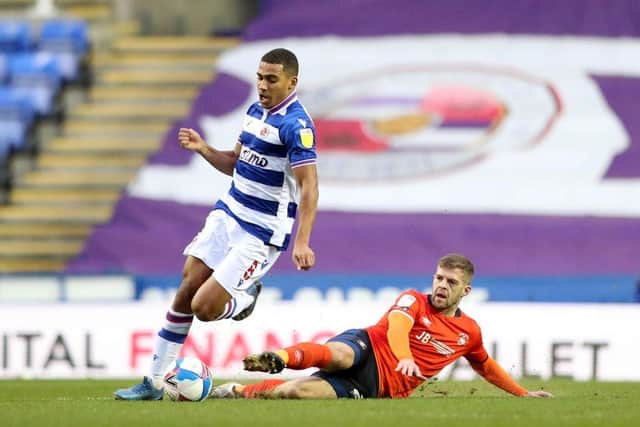 Andy Rinomhota, left, in action for Reading - he is tackled by ex-Pompey defender Martin Cranie, now at Luton Town. Photo by Naomi Baker/Getty Images.