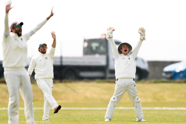 Howzat! Portsmouth CC trio (from left) Hemanshu Herani, James Christian and Alex Hammond appeal. Picture: Keith Woodland