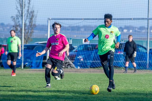 Action from the first grassroots game in Portsmouth after lockdown restrictions were eased - AFC Trades (pink) v Fratton Trades  at the Langstone Harbour ground on Eastern Road. Picture: Habibur Rahman