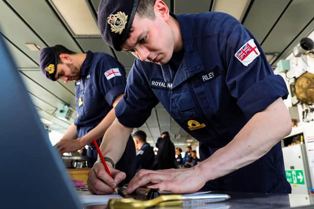 Sub Lieutenant Jonathan Riley on the bridge of HMS Duncan. Photo by LPhot Paul Hall