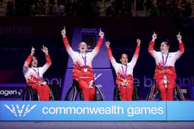 From left - Charlotte Moore, Lucy Robinson, Joy Haizelden and Jade Atkin after winning gold in the Women's 3x3 Wheelchair Basketball event at the Glasgow Commonwealth Games. Picture: James Fearn/Getty Images