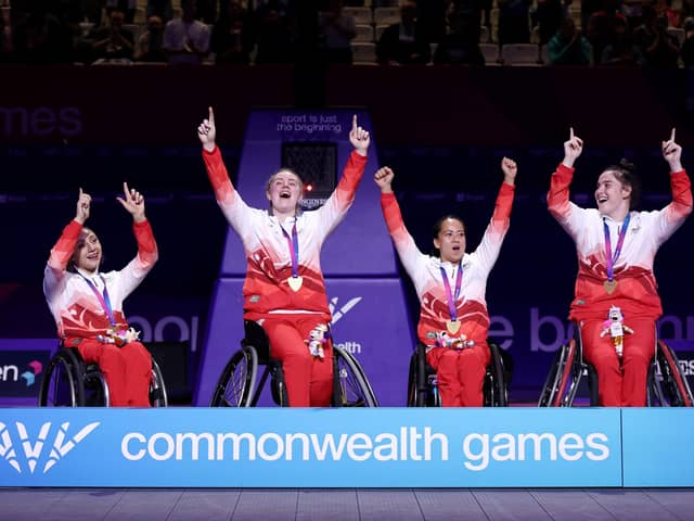 From left - Charlotte Moore, Lucy Robinson, Joy Haizelden and Jade Atkin after winning gold in the Women's 3x3 Wheelchair Basketball event at the Glasgow Commonwealth Games. Picture: James Fearn/Getty Images