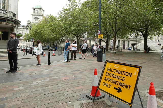 The queue at the Covid-19 Vaccination Centre at Lalys Pharmacy, Guildhall Walk, PortsmouthPicture: Chris Moorhouse (jpns 100621-01)