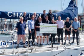 Barratt Homes employees are invited on board as they present Tall Ships Youth Trust (TSYT) with a cheque for £20,000.