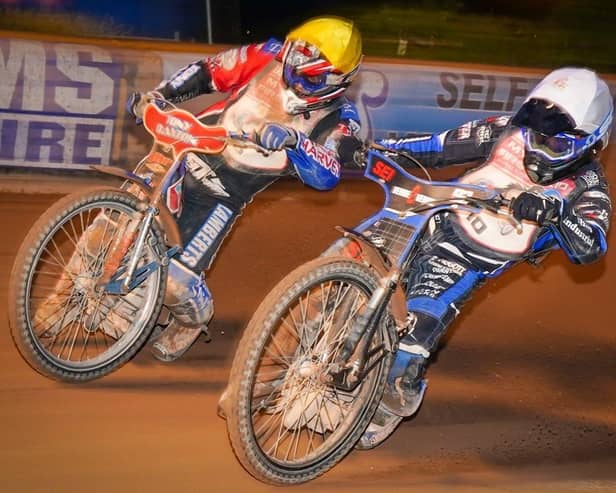 Charley Powell, right, and Chris Widman battle it out on the track. Picture: Ian Groves/Sportography