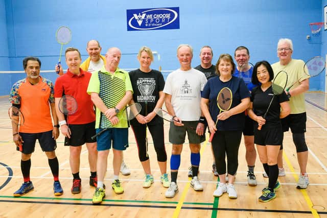 Pictured is: Steve Black (White T-Shirt) with other members of the 0900 Badminton Club.
Picture: Keith Woodland (191121-6)