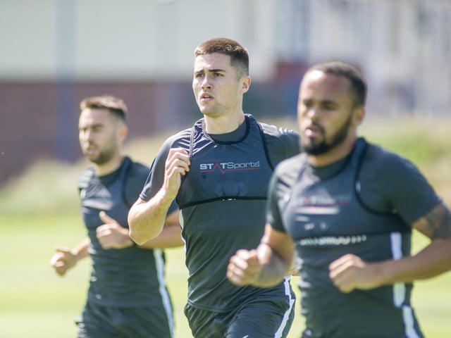 Triallist Aaron Jarvis, Ben Close and Anton Walkes in pre-season training in June 2019. Picture: Habibur Rahman