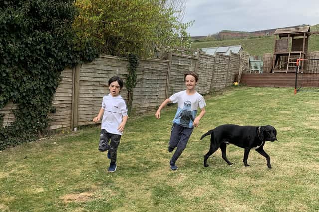 Leo and Max McHugh, 8 and 6, are taking on a back garden marathon to raise funds for the NHS