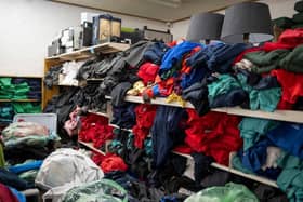 Shelves full of school uniform donated to a community charity Picture: Matthew Horwood/Getty Images