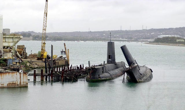 O-Class Submarines two of the boats formerly based at HMS Dolphin, Gosport, now waiting to be cut-up for scrap at Pound's shipbreakers yard at Tipner, Portsmouth. Picture: Michael Scaddan 006051-0018