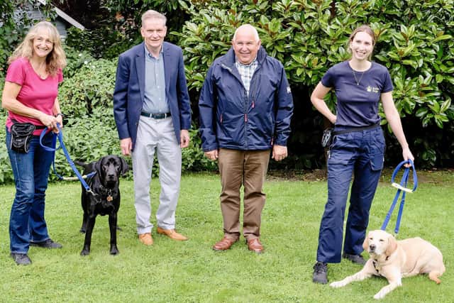 From left - Puppy Raiser Mandy with pup Joshua, Steve Allum and Dave Wood, head of Hampshire and IoW Royal Arch Freemasons and their charity lead respectively, and Puppy Development Advisor Steph with pup Benny.
