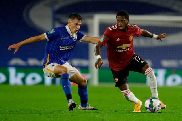 Brighton's Irish midfielder Jayson Molumby vies with Manchester United's Brazilian midfielder Fred.  Picture: Matt Dunham/POOL/AFP via Getty Images