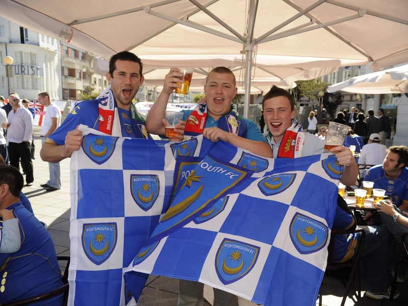 Pompey fans, from left, Callum Mecalfe, Josh Barnes and Mike Taylor enjoy a beer in the pub in Braga in 2008.
