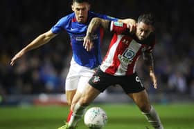 James Bolton battles with Southampton's Danny Ings when the sides met in the Carabao Cup in September 2019. Picture: Joe Pepler