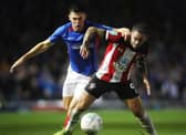 James Bolton battles with Southampton's Danny Ings when the sides met in the Carabao Cup in September 2019. Picture: Joe Pepler