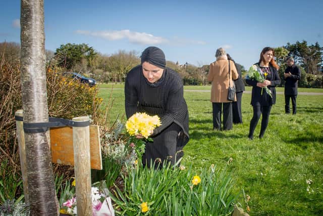 Communities gather at the Halabja memorial at Castle Field, Southsea on 16 March 2020 to remember the massacre against the Kurdish people that took place on 16 March 1988.

Pictured: Jhyan Khaykhasrow laying a flower in memory of her father who died in the massacre.
Picture: Habibur Rahman