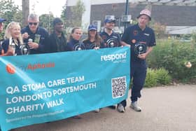 Joel (centre) with QA Hospital staff who marched from London to Portsmouth in aid of SayAphasia.