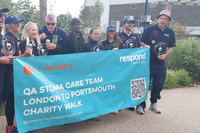Joel (centre) with QA Hospital staff who marched from London to Portsmouth in aid of SayAphasia.
