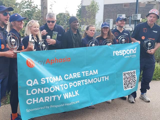 Joel (centre) with QA Hospital staff who marched from London to Portsmouth in aid of SayAphasia.