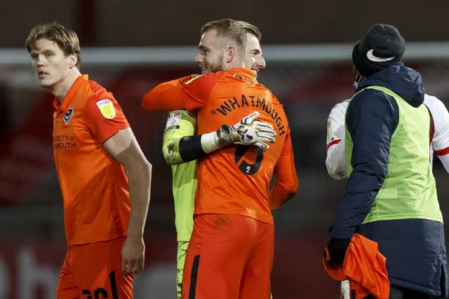 Craig MacGillivray of Portsmouth and Jack Whatmough of Portsmouth celebrate after the Sky Bet League One match between Fleetwood Town and Portsmouth at Highbury Stadium on January 16th 2021 in Fleetwood, England. (Photo by Daniel Chesterton/phcimages.com)