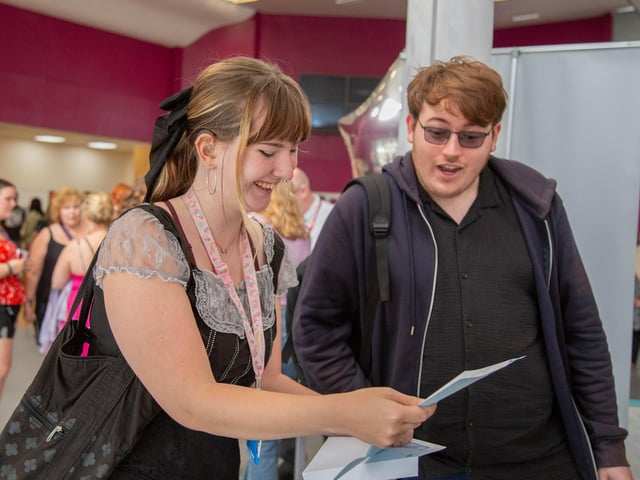 Pictured: Students looking at their results.