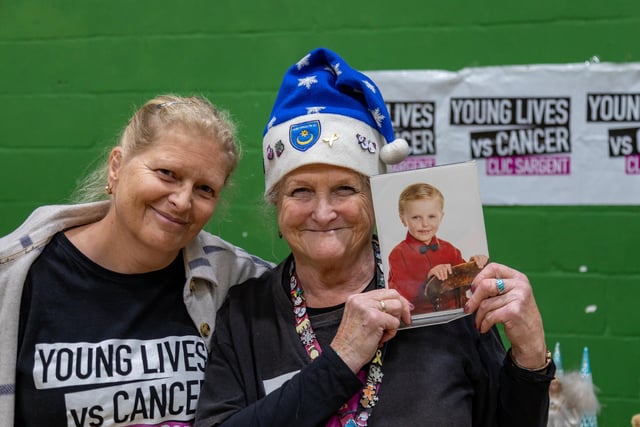 Michelle Cook and mum Heather Richardson at their tombola stall, raising funds for ‘Young lives vs Cancer’ in memory of Clayton Jeffery (pictured) who died aged 4 in 2013. They have raised over £10,000 in the last ten years. Picture: Mike Cooter (091223)