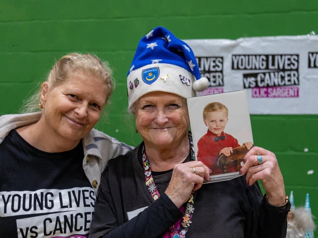 Michelle Cook and mum Heather Richardson at their tombola stall, raising funds for ‘Young lives vs Cancer’ in memory of Clayton Jeffery (pictured) who died aged 4 in 2013. They have raised over £10,000 in the last ten years. Picture: Mike Cooter (091223)
