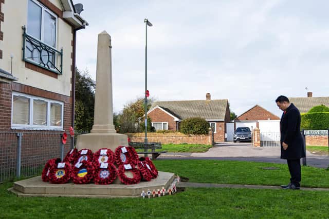 Alan Mak MP pays his respects at the War Memorial in Mengham, Hayling Island