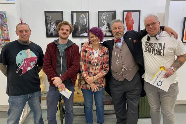 The launch night of Unhooked at Yellow Edge Gallery in Gosport, October 2021. The show is to raise awareness of mental health issues and raise money for Solent Mind.
Centre is Dale Lodge, aka Mernpunk, the show's curator
