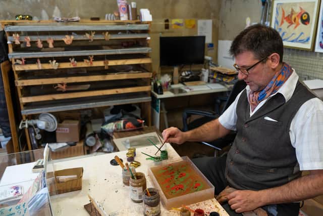 Pictured: James Mouland creating his artwork at his Studio 13 Hotwalls, in Old Portsmouth.

Picture: Andy Hornby