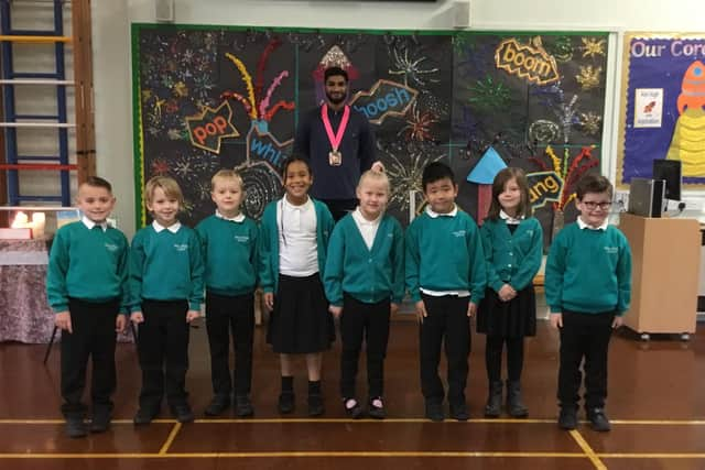 Prad Bains with Hart Plain Infant pupils during the school's Black Lives Matter week.