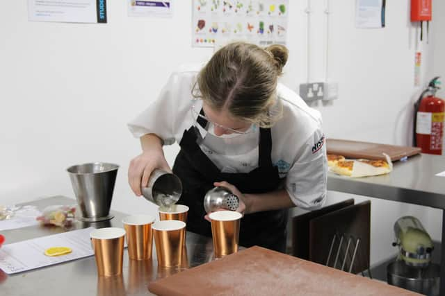 Tilly Yeats, 15, a finalist from Oaklands Catholic School making mocktails at Junior Chef Academy. Picture: Highbury College
