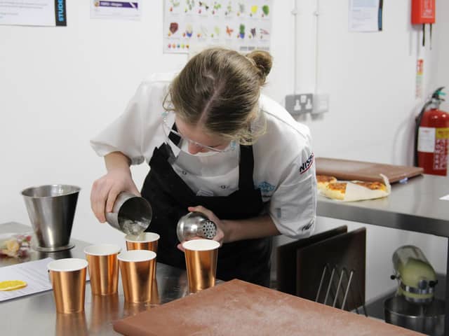 Tilly Yeats, 15, a finalist from Oaklands Catholic School making mocktails at Junior Chef Academy. Picture: Highbury College
