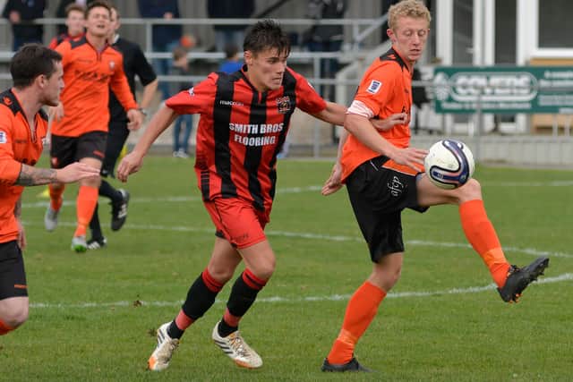 Bradey Norton (red/black) has signed for US Portsmouth
