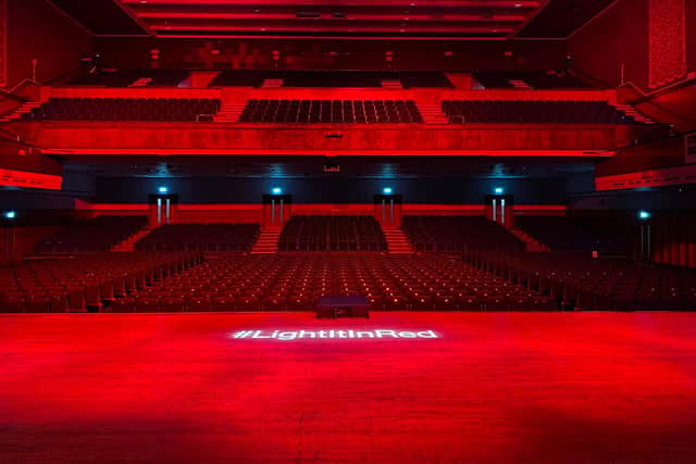 The main auditorium of Portsmouth Guildhall lit up on September 30, 2020, for #lightitinred