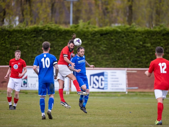 Action from Gosport Town's 4-0 victory over Lee Rangers (blue kit) in the Portsmouth & District FA Trophy final at Cams Alders. Picture: Alex Shute