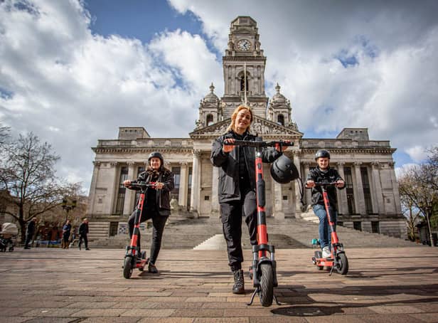 Pictured: Voi scooter team, Jon Hamer, Maria Sassetti and Nikolina Kotur on the e-scooters at Portsmouth Guildhall walk on 15 March 2021.
Picture: Habibur Rahman