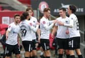 Pompey's players celebrate Callum Johnson's goal against Bristol City. According to Cam Pring, the Blues have the best team spirit he has come across. Picture: David Davies